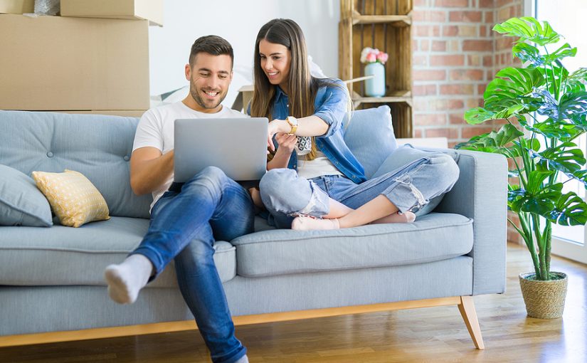 Young couple moving into a new apartment.