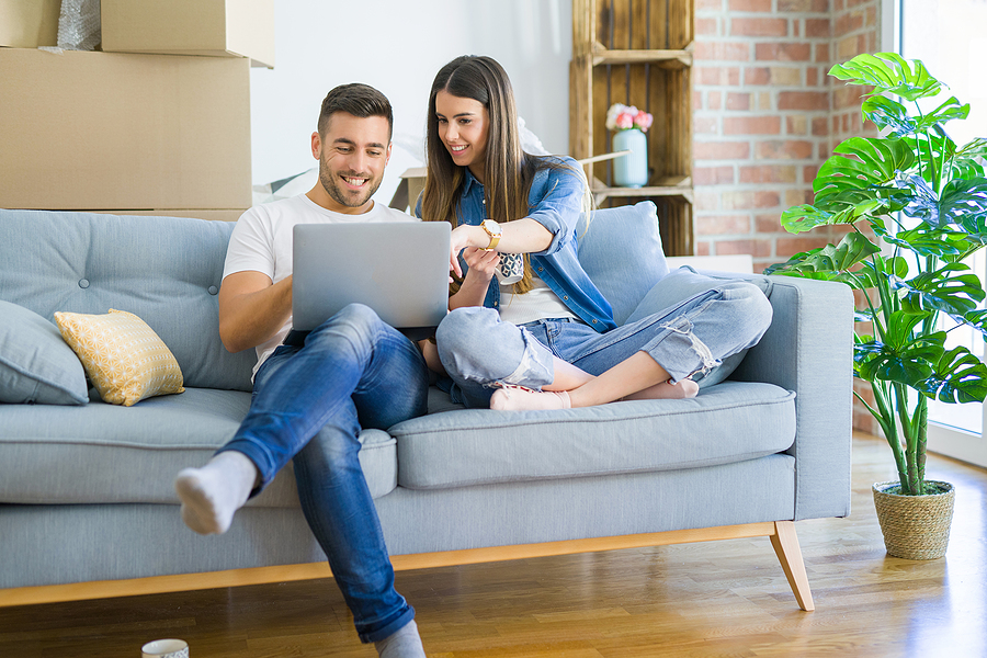 Young couple moving into a new apartment.