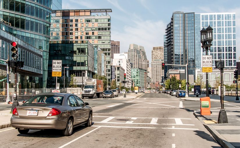 Car stops at light in Boston, Massachusetts.