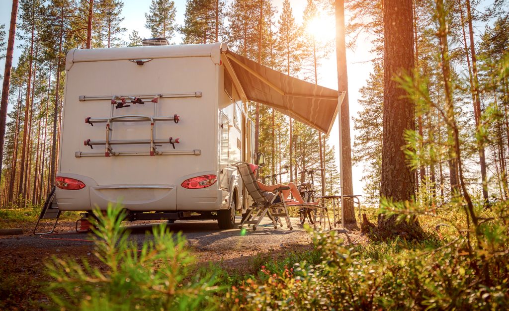 RV set up in wood for camping.