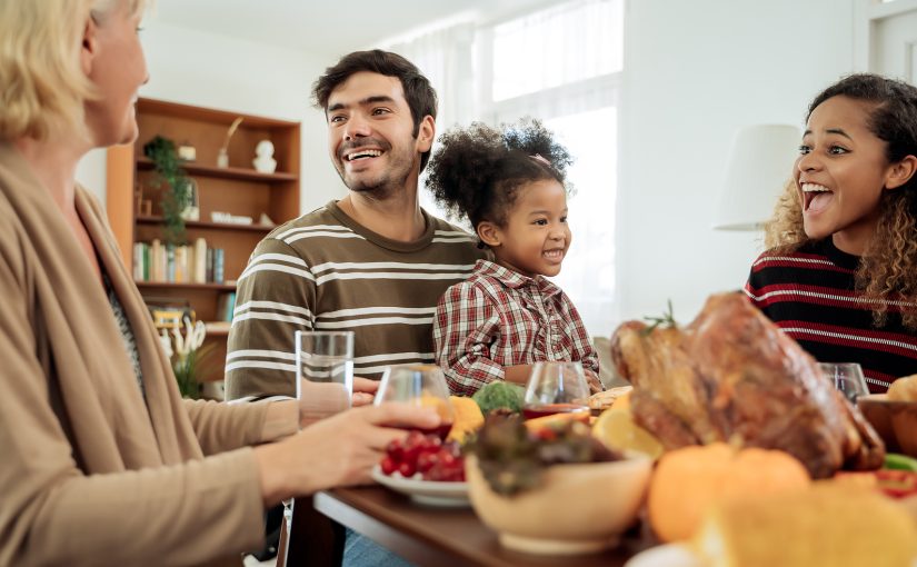 Holiday dinner with guests, including children and the elderly.